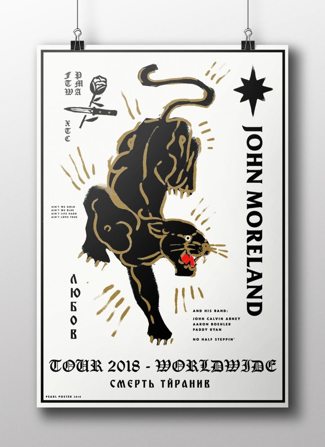 A JOHN MORELAND poster featuring a black panther with a red tongue is edged in gold