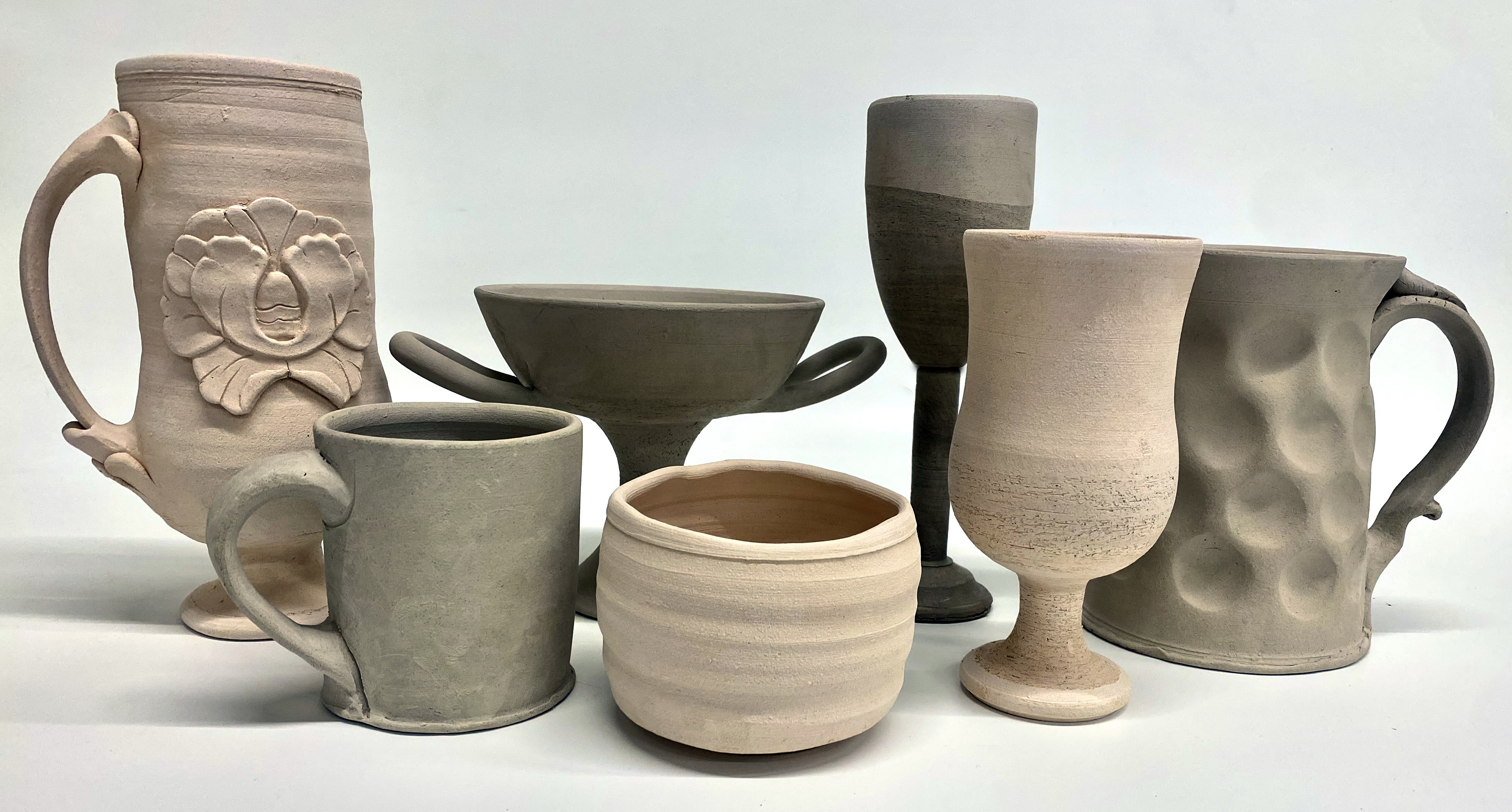 Ceramic cups of various shapes and sizes