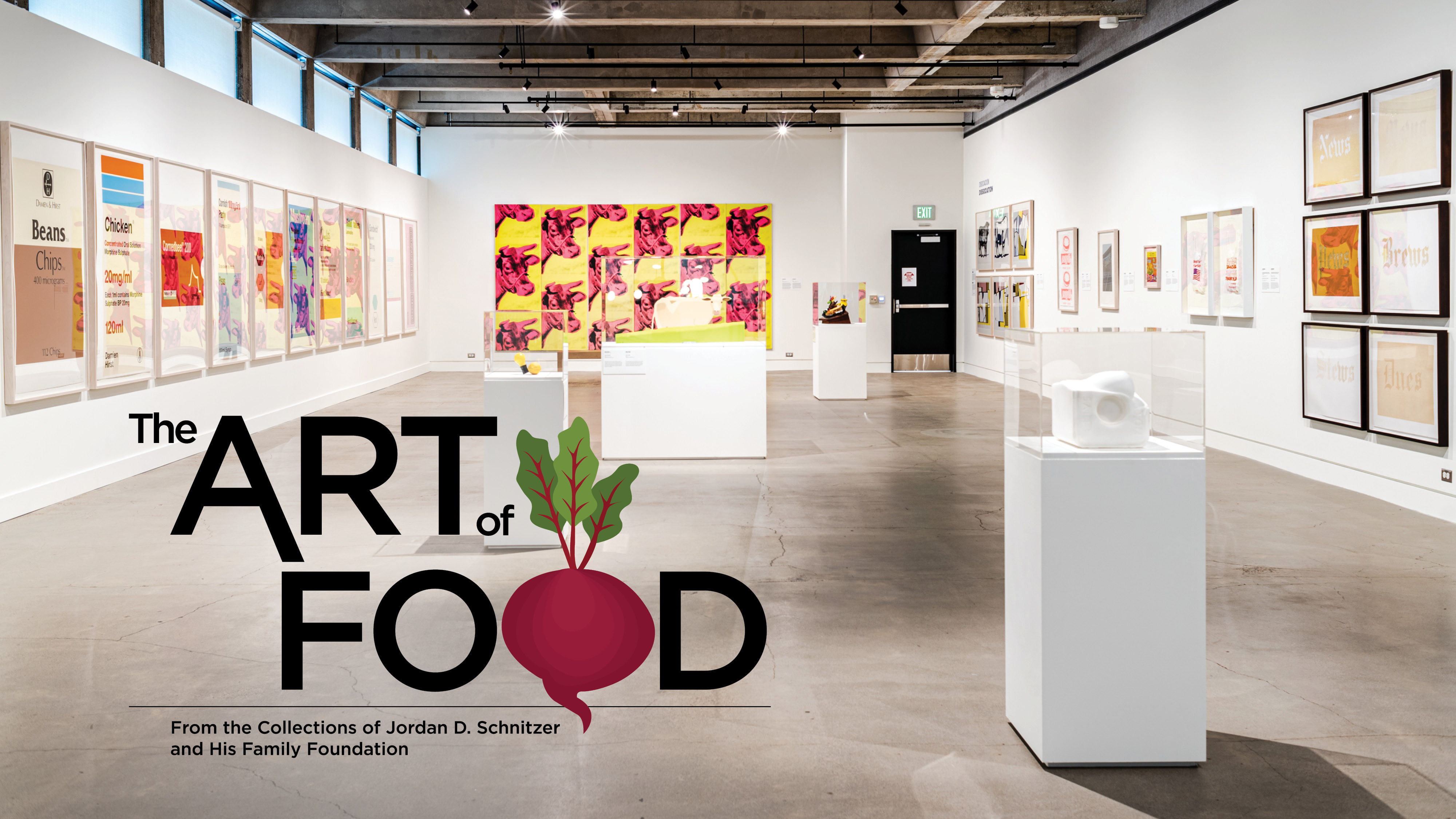 Works of art in a gallery including a series of prints depicting foods as prescription labels, a print of pink cows on a yellow background and a salt sculpture on a plinth. A logo reads "The Art of Food."