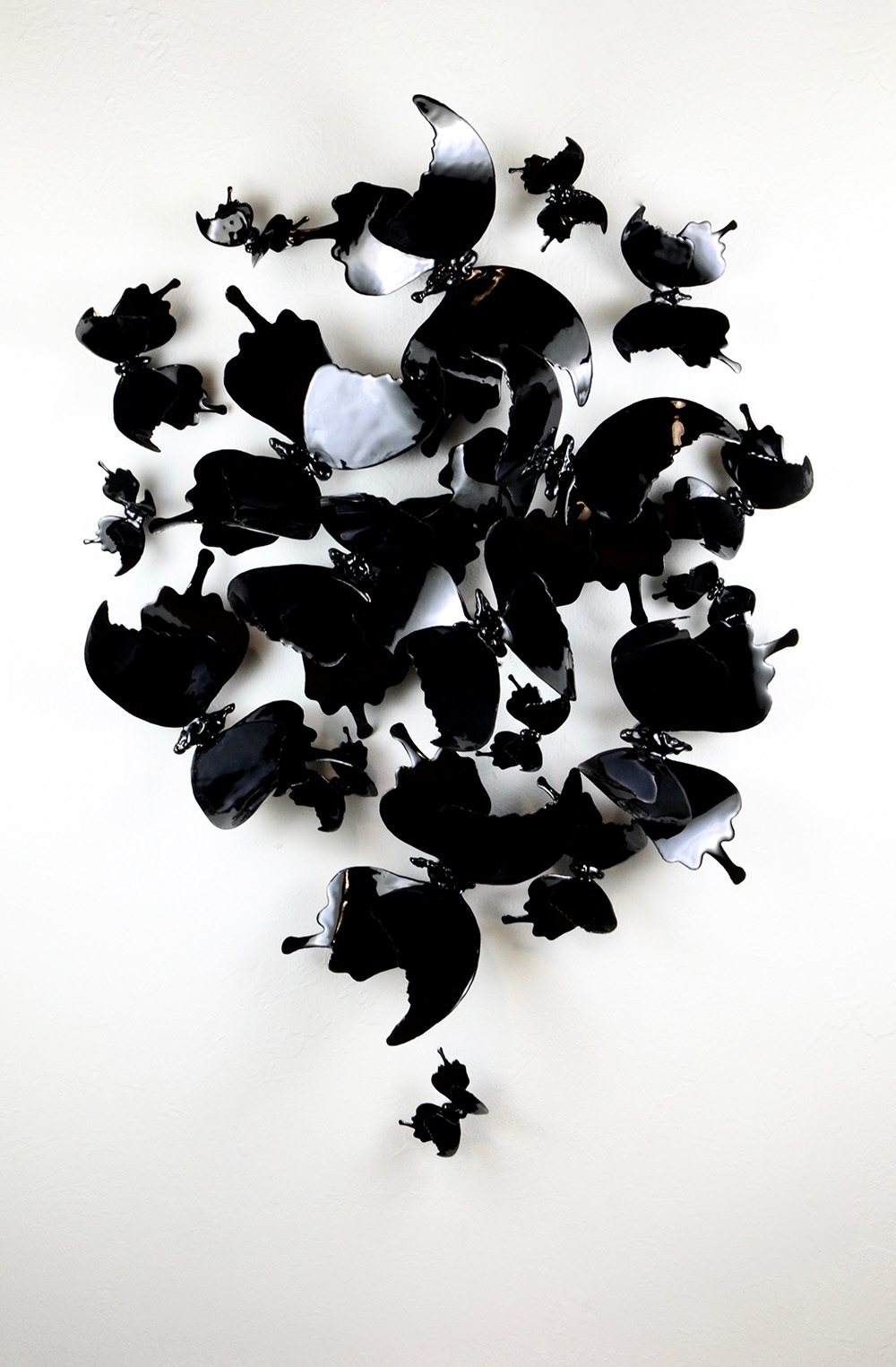 Christie Hackler's Thomas The Swallowtail piece comprising of a swarm of black metal butterflies