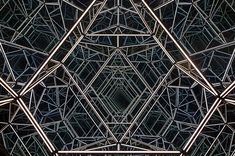 Close-up view of reflecting lights arranged in a geometric pattern
